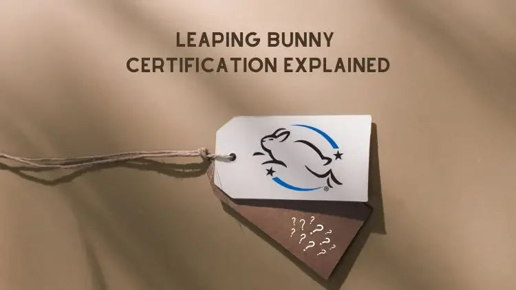 Leaping Bunny certification tag on beige background with certification explained text
