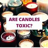 Assorted candles in jars with text overlay asking 'Are candles toxic?'
