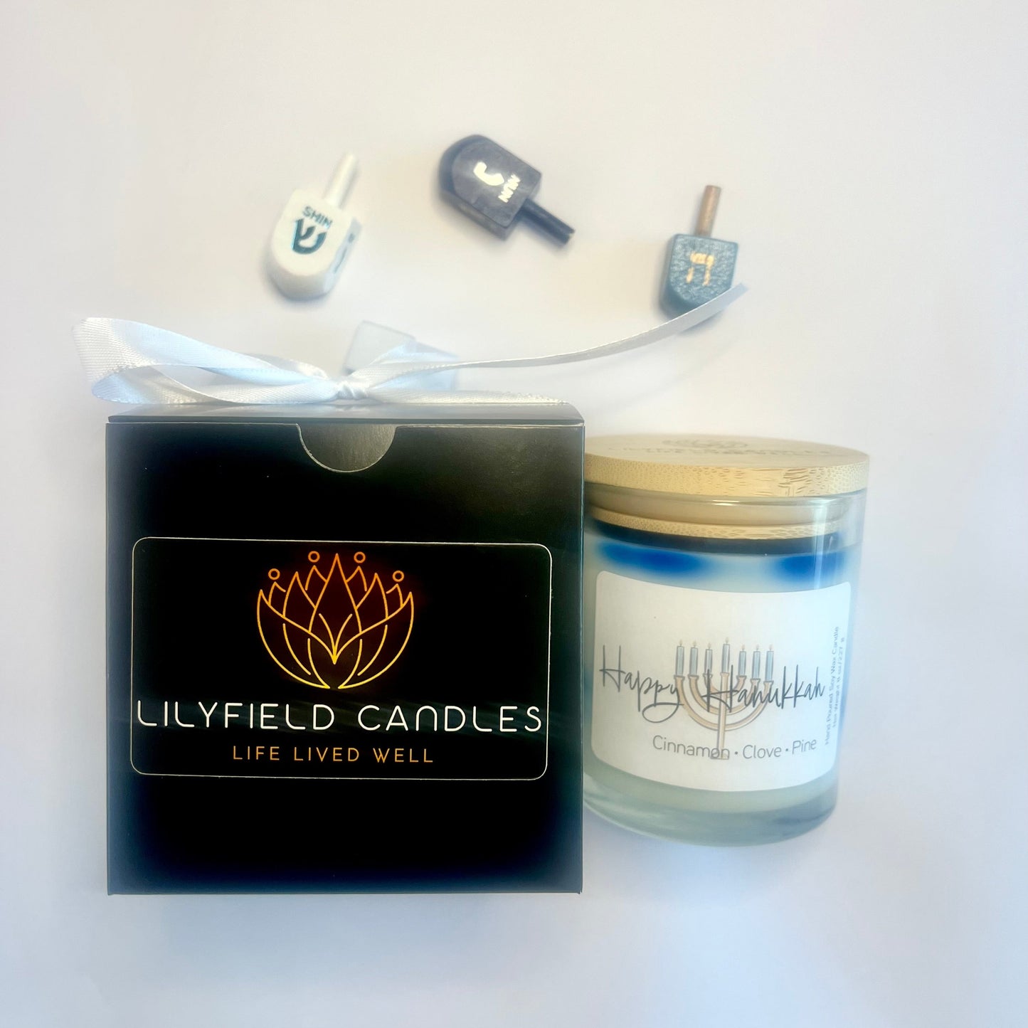 Hanukkah soy candle perfect for the celebration of lights to bring the scent of fir, pine and cinnamon into your home for the holiday season